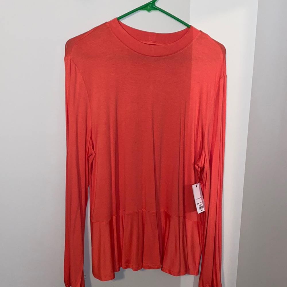 Coral long sleeve peplum top